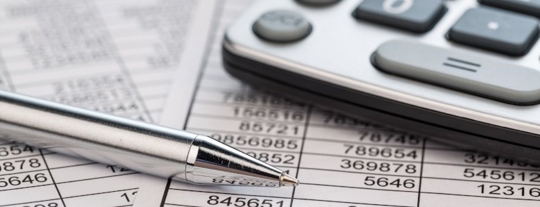 Spreadsheet with calculator and pen